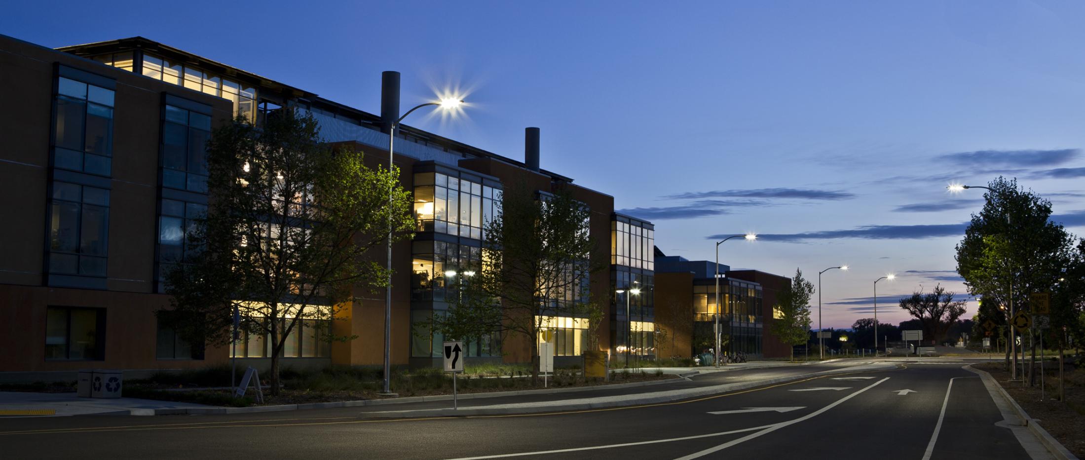 Building at night with street lighting