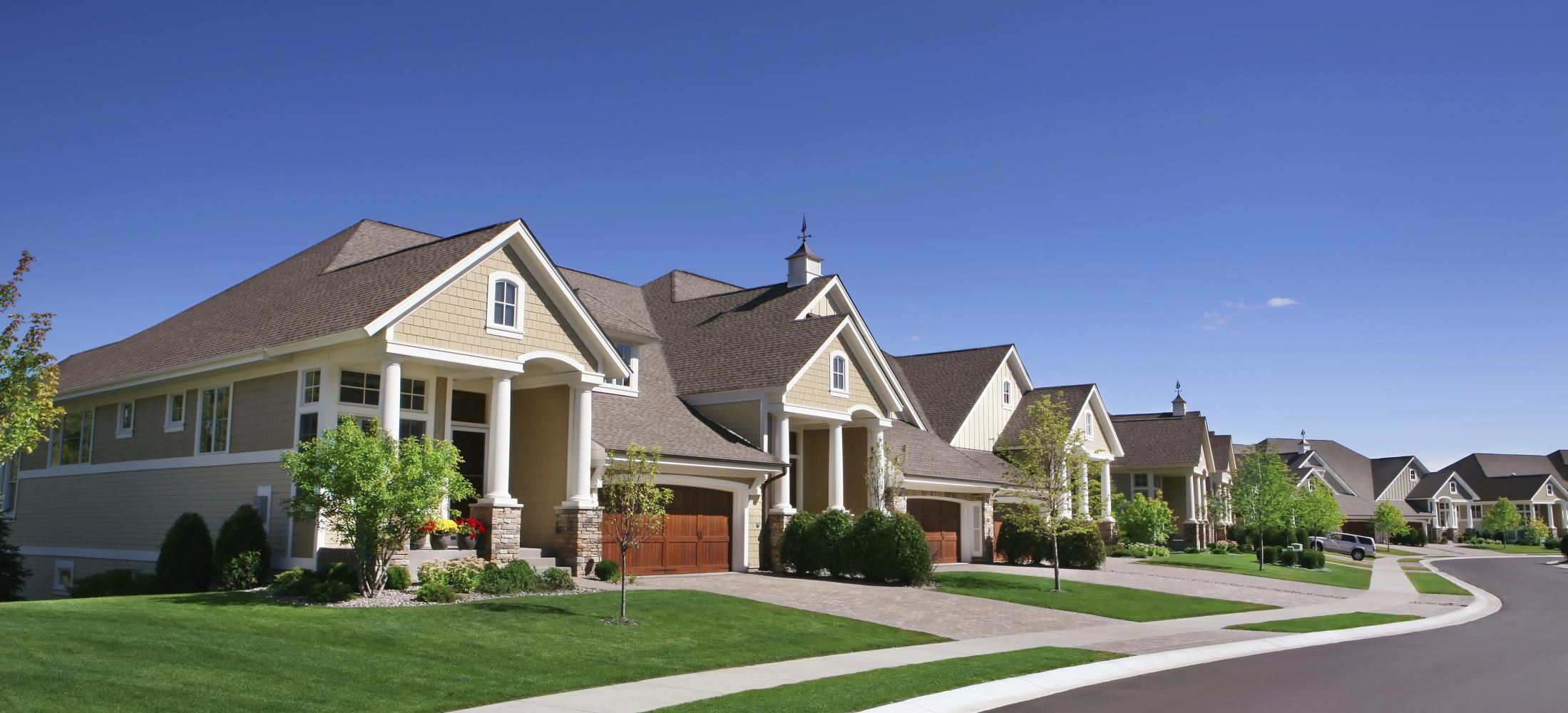 Street view of multiple residential homes in a row