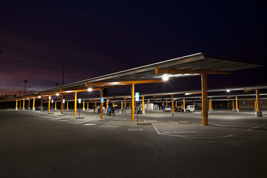 The new parking structure at night with solar panels
