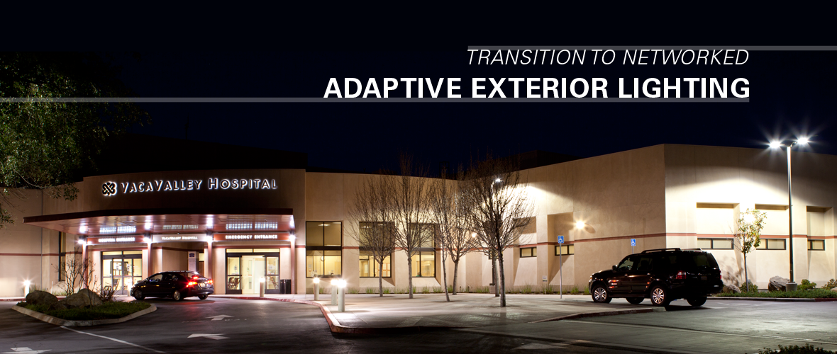 Transition to Networked Adaptive Exterior Lighting (A parking lot at night with exterior lighting)