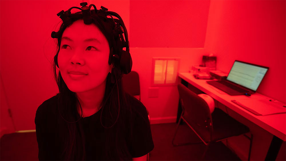 Veronica under red lighting
