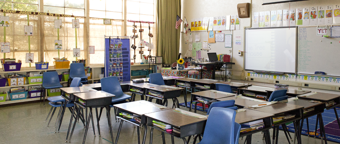 Desks in an empty K-12 classroom