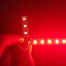 Close-up of a red LED strip light