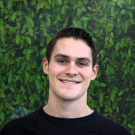 Drew with leafy backdrop